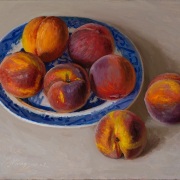 230919-yellow-peaches-on-a-blue-and-white-plate-14x11