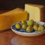 240229-cheese-with-olives-on-a-saucer-8x6